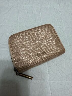 The Sak Metallic Rose Gold Compact Zip Wallet